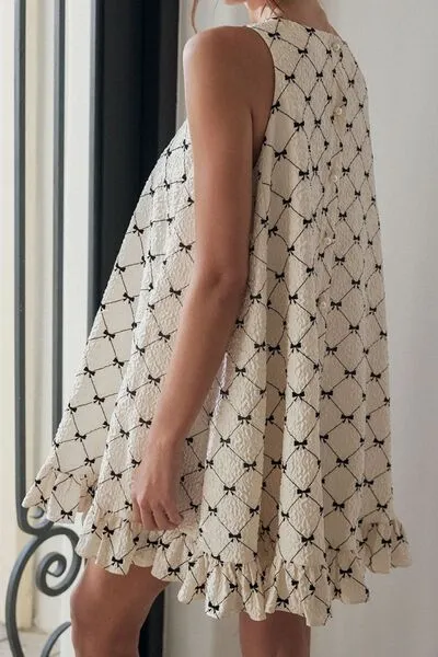 Ruffled Hem Bow Print Sleeveless Mini Dress